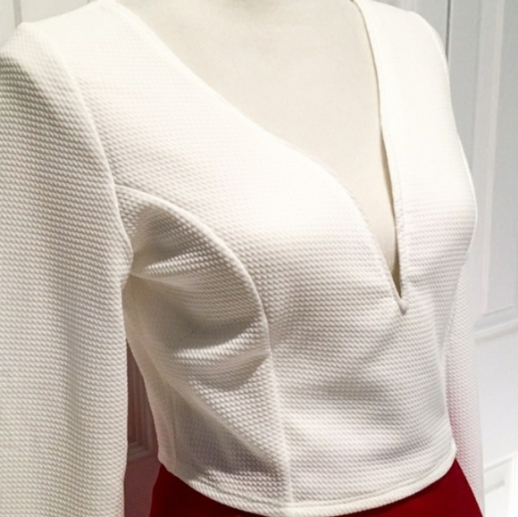 Body Central Tops - Sexy Long Sleeve White Low V Cut Top